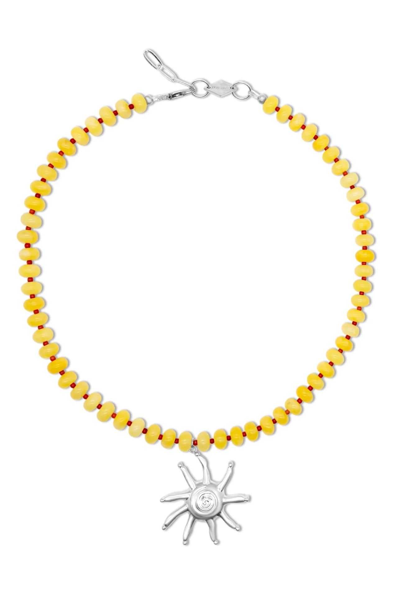 Yellow beaded bracelet with a silver sun charm on a white background