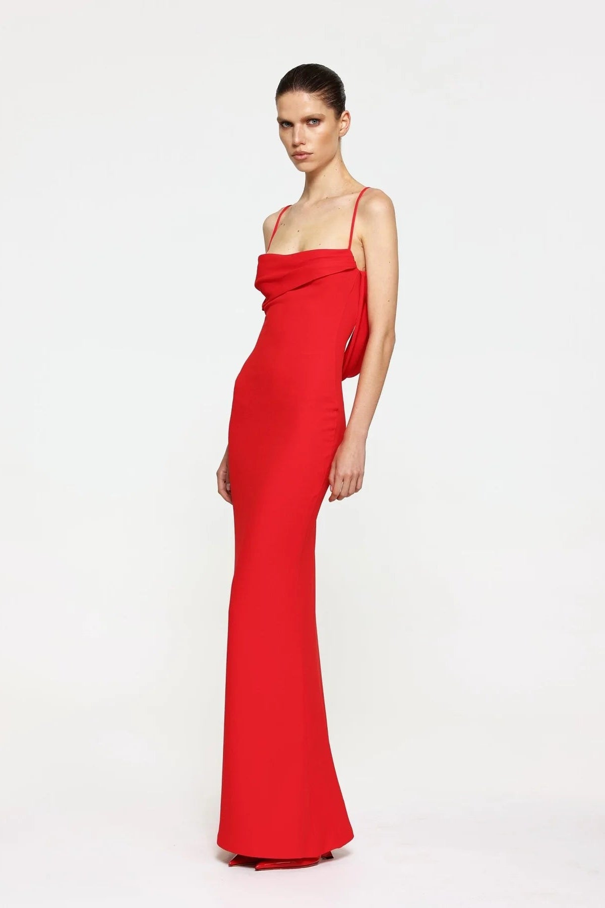 Red strapless gown on a white background