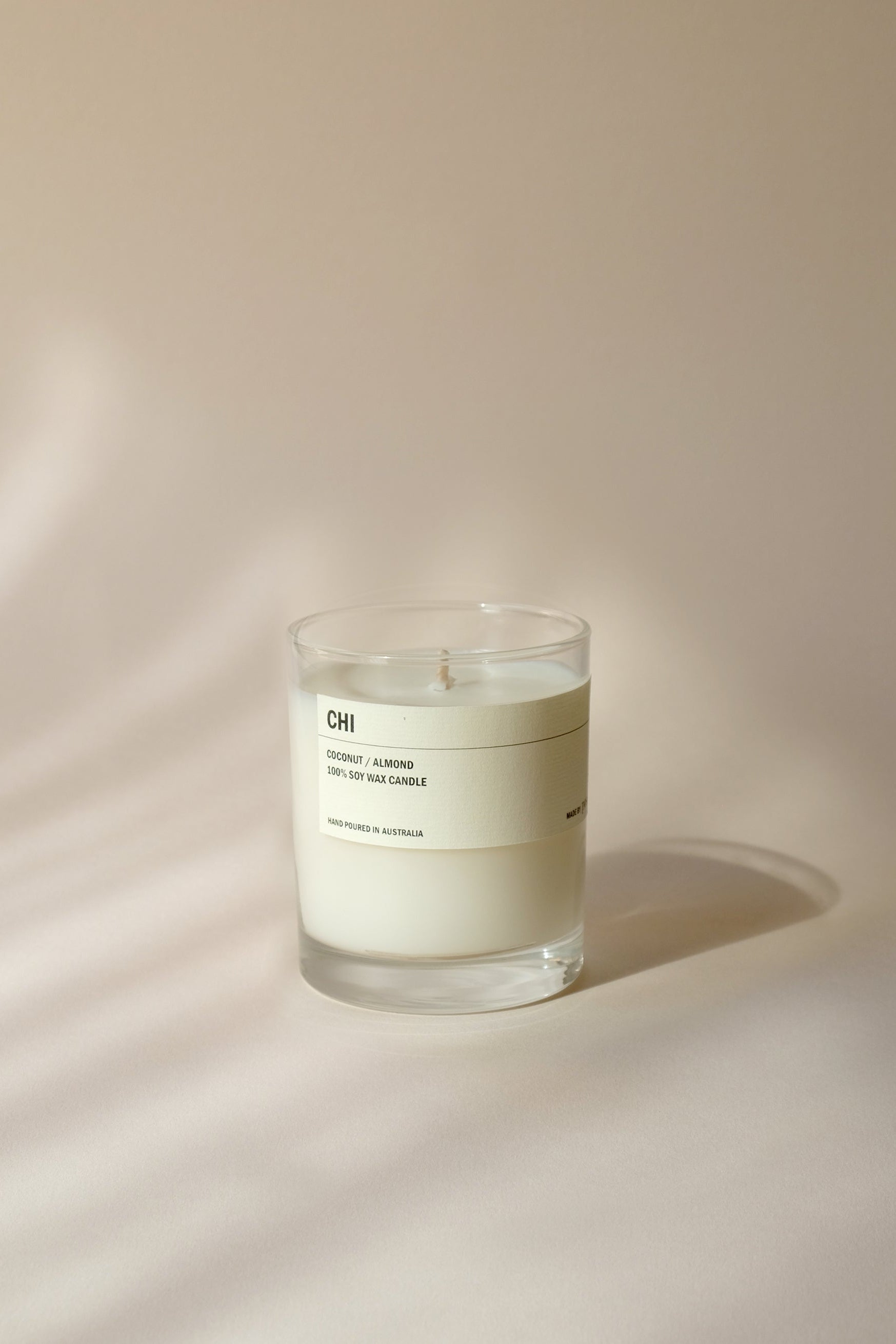 CHI - COCONUT / ALMOND CLEAR CANDLE 300G