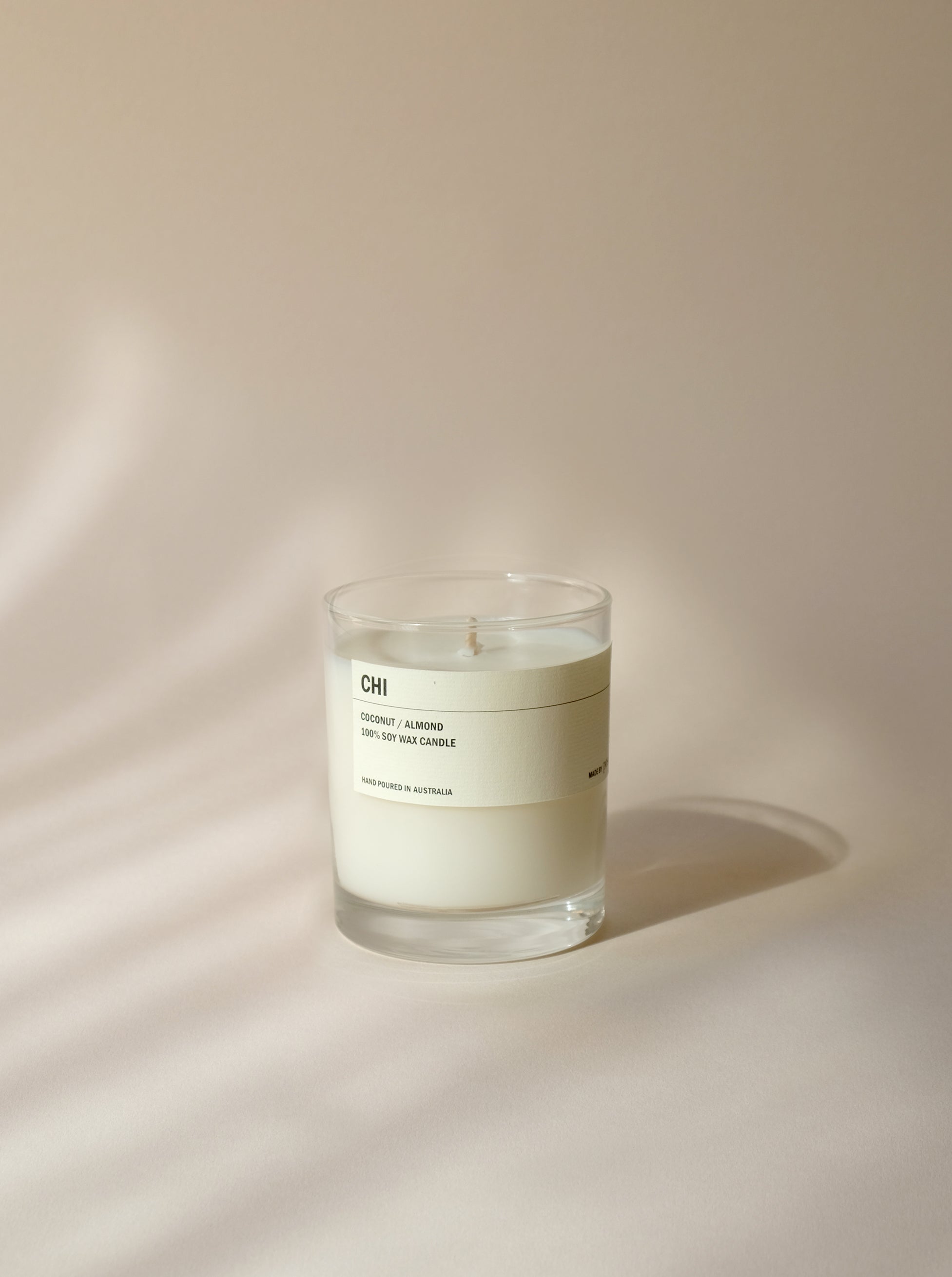 CHI - COCONUT / ALMOND CLEAR CANDLE 300G
